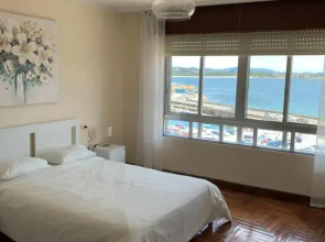 Piso en el malecón de Riveira con vistas a las Rias Baixas. Ideal para familias. 140m