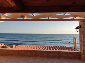 Maritinas Stone House & Apartment On The Beach