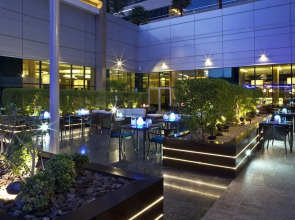 Отель Novotel Suites Mall Avenue Dubai