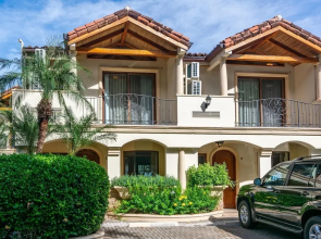 Modern Oceanfront Condo with a Chic Coastal Design, Resort-Style Amenities, and Direct Beach Access