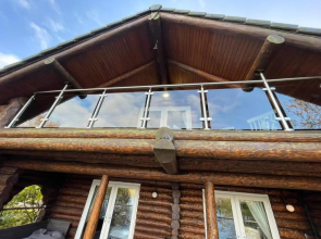 Woodpecker Log Cabin with hot tub, pizza oven bbq entertainment area, lakeside with private fishing peg situated at Tattershall Lakes