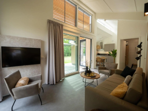 Luxurious villa with sauna, in a holiday park, 900 m. from the beach