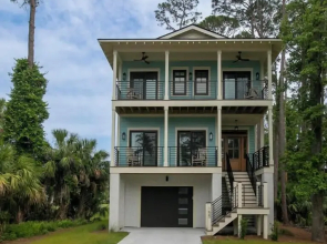 Experience Modern Coastal Living in This Beautifully Designed 4-bed, 4-bath Home