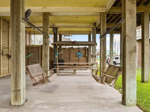 Barefoot Steps To The Beach 4 Bedroom Home by RedAwning