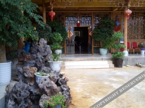 Puzhehei Chengshi Nongyuan Hotel