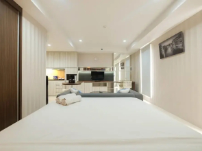 Elegant and Comfy Studio Azalea Suites Apartment Cikarang