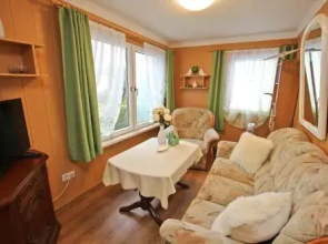 Ferienhaus mit Ruderboot Kummerow