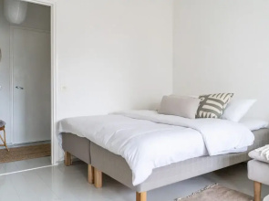Upper floor studio with a balcony