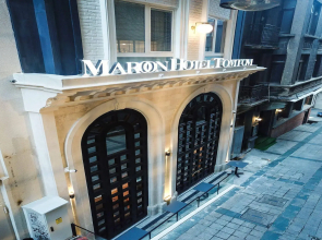 Maroon Tomtom Hotel