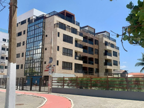 Apartamento alto padrão em condomínio pé na areia