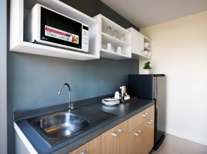 The Grass Serviced Suites by At Mind