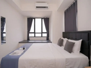 Good and Cozy 2BR at Collins Boulevard Apartment