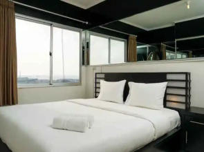2BR + 1 Study Room Cozy Apartment Seaview at Mediterania Marina Ancol By Travelio