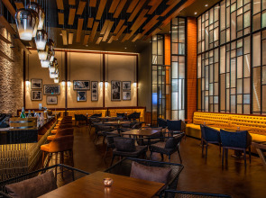 Al Jaddaf Rotana Suite Hotel