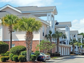 Magnolia Pointe 101 4828 by RedAwning