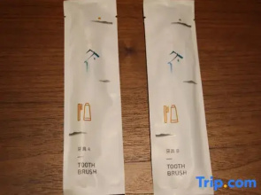 Jinghong Tianqing Hotel (Yijin Holo City Government Shop)