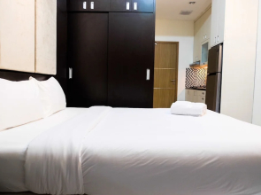 Warm and Homey Studio at The Oasis Cikarang Apartment By Travelio
