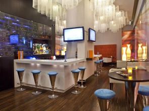 Отель Novotel Suites Mall Avenue Dubai