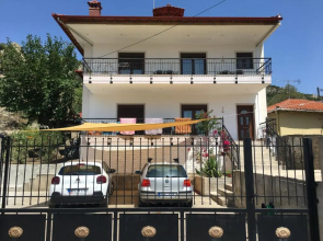 Stone house under a rock Kukos