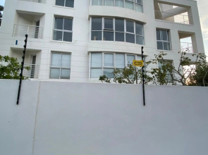 Cozy two bedroom unit in Strand with pool gym and laundromat