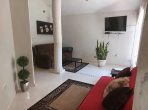 Room in Apartment - Cozy Mérida Retreat With Pool & Garden View