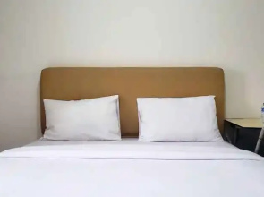 Cozy and Warm Studio at Cinere Resort Apartment By Travelio