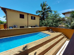 Sapeca - Novo Flat c/ piscina, 50mts da praia, churrasqueira privativa, ar con, wi-fi, netflix. 4pessoas, garagem