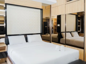 Cozy 1BR Scientia Residence Apartment near Summarecon Mall Gading Serpong By Travelio
