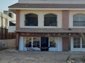 Beach apartment in front of the sea
