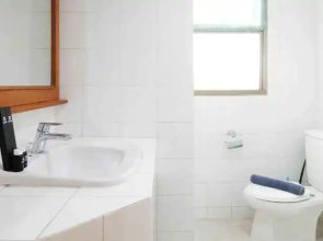 Homey and Extra Spacious 2BR at Kondominium Puncak Marina Apartment By Travelio
