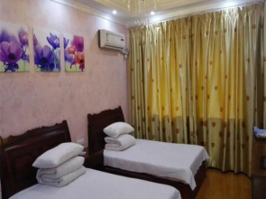 Xi Ke Lai Business Inn