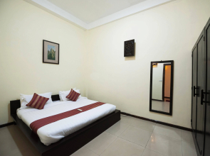 The Cadillac Riverside Suites