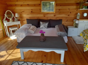 Log cabin retreat and luxury bell tent
