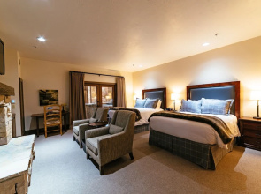 Deluxe Two Queen Room With Fireplace Hotel Room by RedAwning