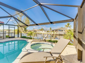 Luxe Waterfront Oasis w/ Dock, Heated Pool & Spa!