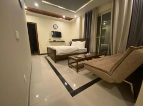 AK Hotel & Suites