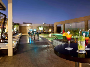 Отель Novotel Suites Mall Avenue Dubai