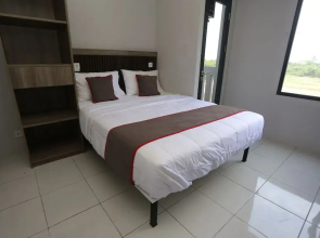 Capital O 95049 Aurora Rooms Riverdale