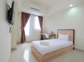 Warm And Cozy Studio At Evenciio Margonda Apartment