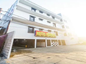 OYO 93133 Hotel Moraja Near Stikes Abdi Nusantara