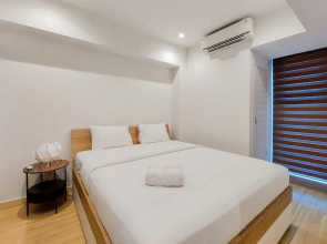 A Luxury 1BR Bali Style Apartment at Branz BSD City