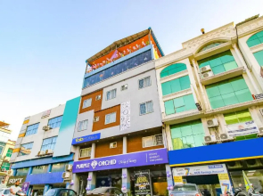 Fabhotel Prime Purple Orchid