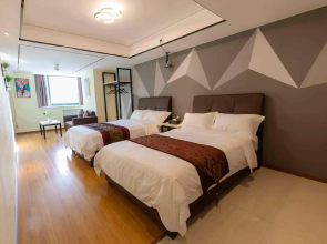 Yiwo Apartment (Zhanjiang Wanda Plaza Branch)