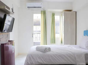 Warm and Nice Studio at Podomoro Golf View Apartment