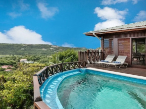 Charming Cottage Located In Cap Estate - Orchid Cottage 1 Bedroom Home by RedAwning