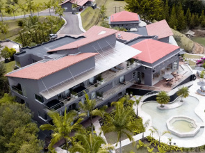 Tau House