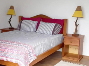 Honey Moon - Vista do mar na cama.