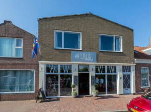 Groepsappartement- Dorpsplein 6 Koudekerke Pleinzicht