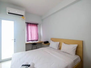Homey and Comfy Studio Tamansari Mahogany Apartment