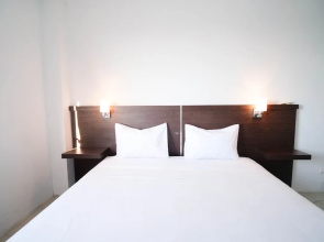 Simple 2Br With Extra Bed At Menara Rungkut Apartment